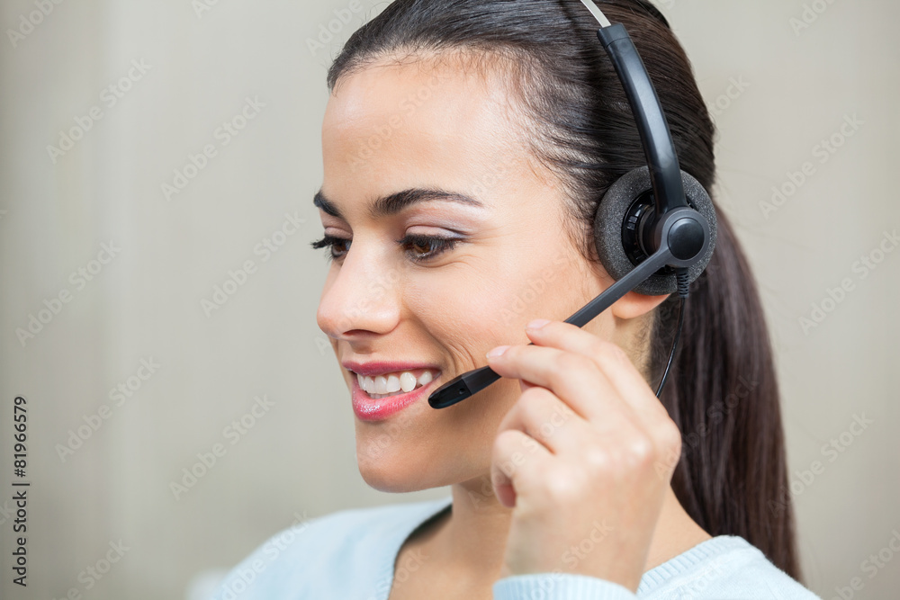 Customer Service Representative Using Headphones Customer Service Representative Using Headphones