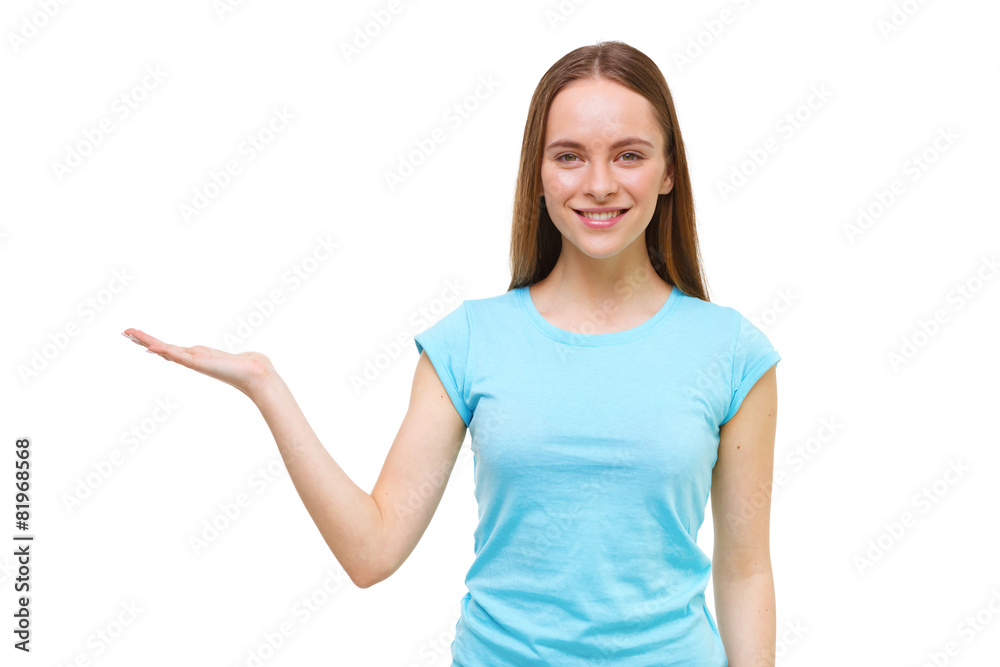 Young woman presenting something with open hand isolated on whit Young woman presenting something with open hand isolated on whit
