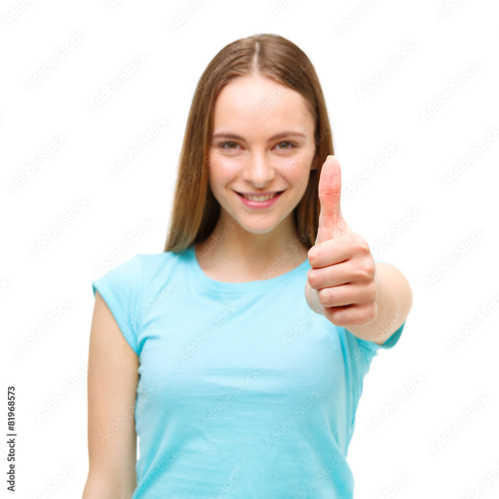 Portrait of a woman showing thumbs up sign and smiling isolated Portrait of a woman showing thumbs up sign and smiling isolated