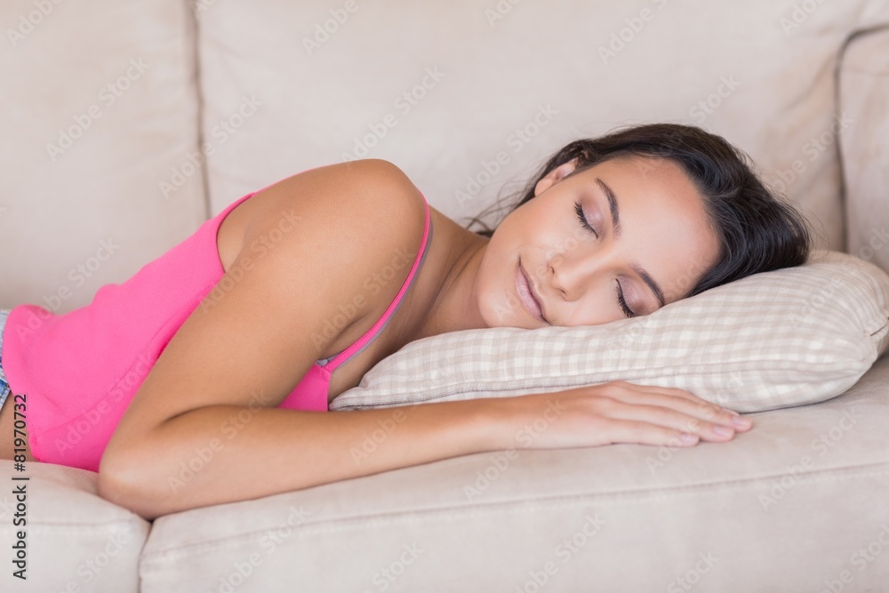 Pretty brunette relaxing on the couch Pretty brunette relaxing on the couch