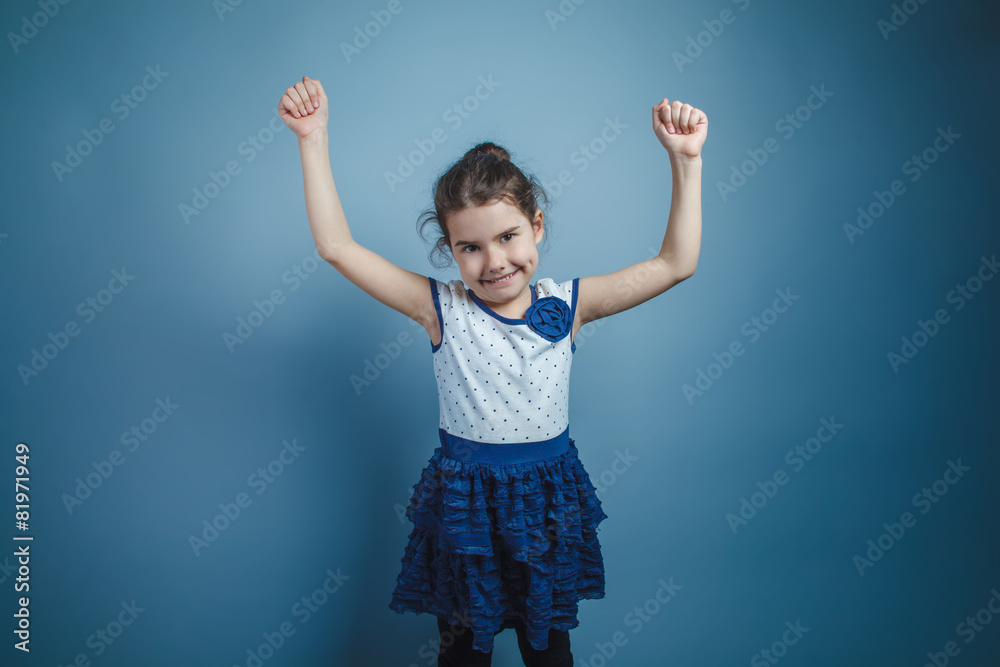 a girl of seven European appearance brunette raised her arms up a girl of seven European appearance brunette raised her arms up
