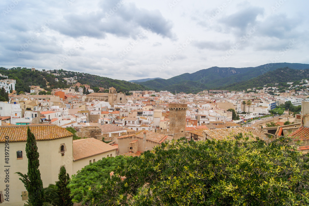 old Spanish town between green hills