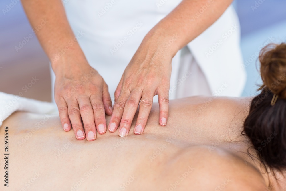 Obraz premium Brunette getting back massage