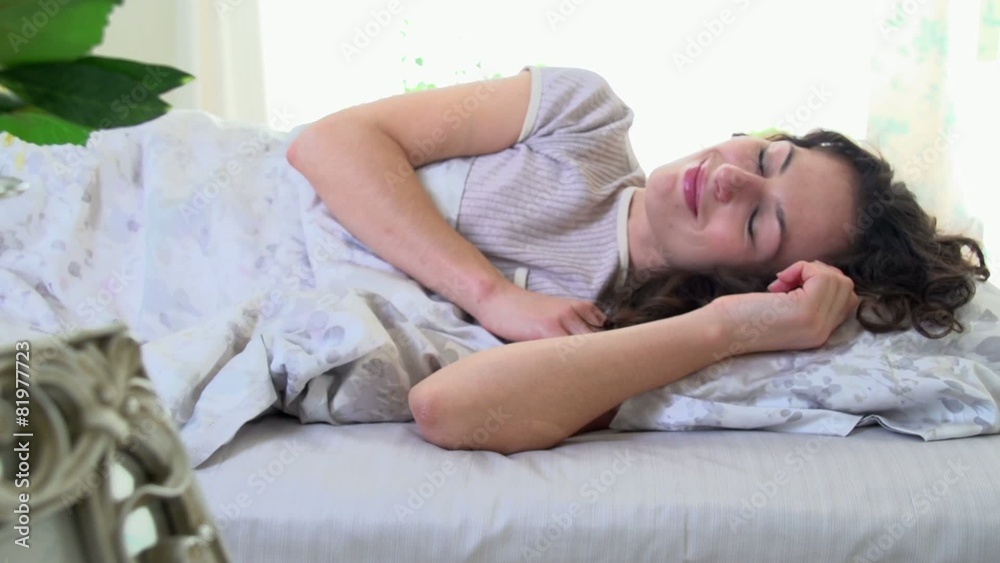Sleeping Woman in her Comfortable Bed Sleeping Woman in her Comfortable Bed