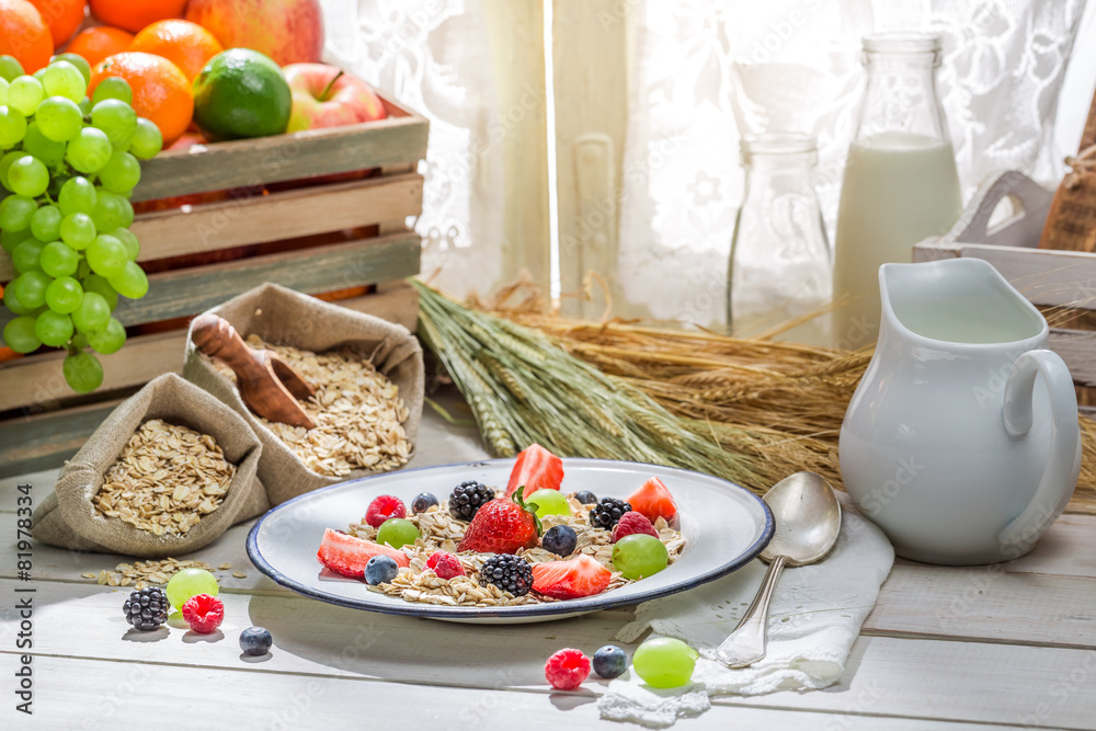 Tasty oatmeal with fresh fruits for breakfast Tasty oatmeal with fresh fruits for breakfast