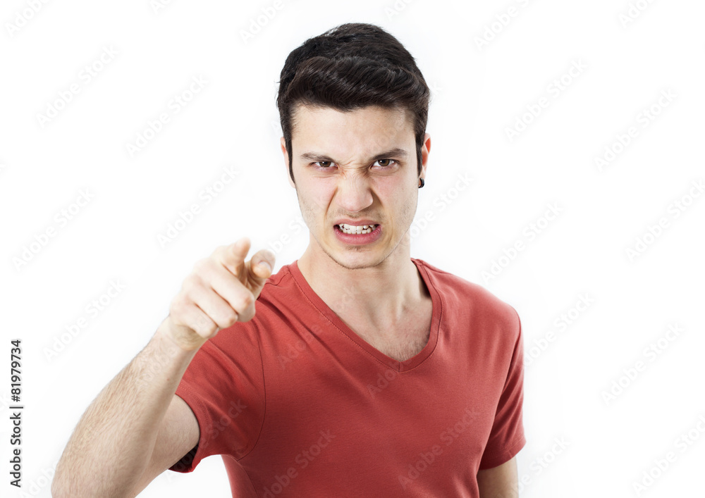 Angry young man pointing on you Angry young man pointing on you