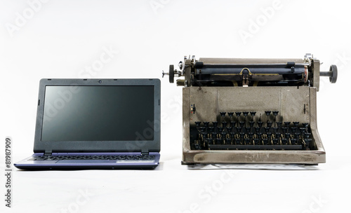 New laptop computer vs old vintage typewriter