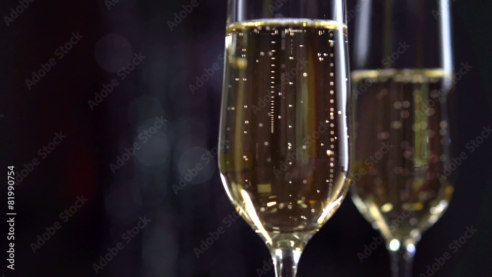 Flutes with sparkling champagne closeup. Slow motion full HD