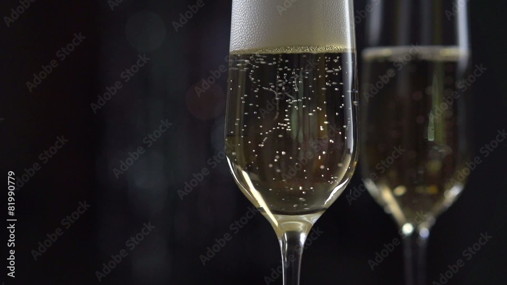 Flutes with sparkling champagne closeup. Slow motion full HD