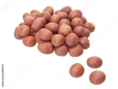 Little red patatoes on white background