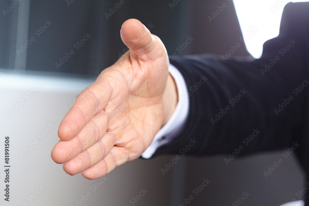 © fox17 - Businessman extending hand to shake © fox17 - Businessman extending hand to shake