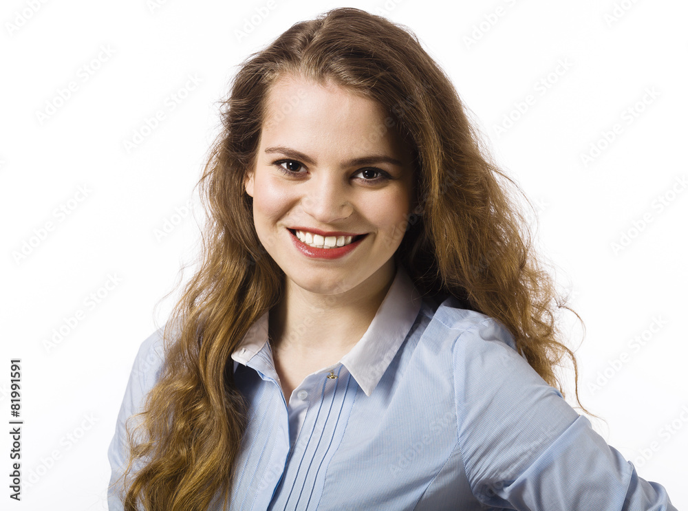 Portrait of a beautiful smiling young woman dressed in a blue sh Portrait of a beautiful smiling young woman dressed in a blue sh