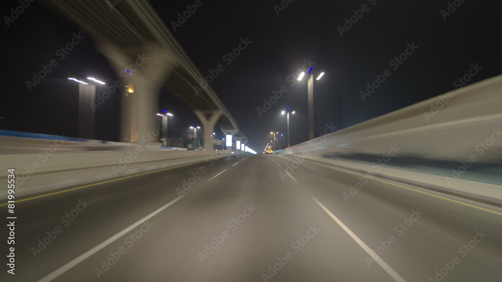 Road and tunnel on the Palm Jumeirah island in Dubai at night Road and tunnel on the Palm Jumeirah island in Dubai at night