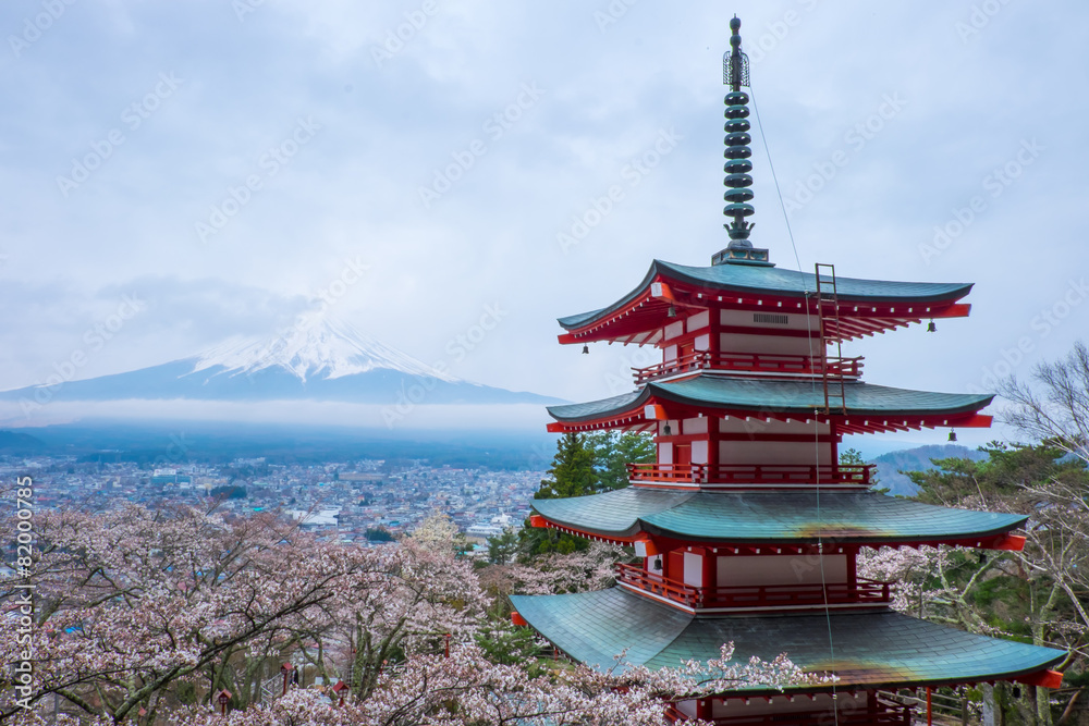 Japanese pagoda with mount Fuji / Chureito pagoda with mouth Fuji background on cloudy day