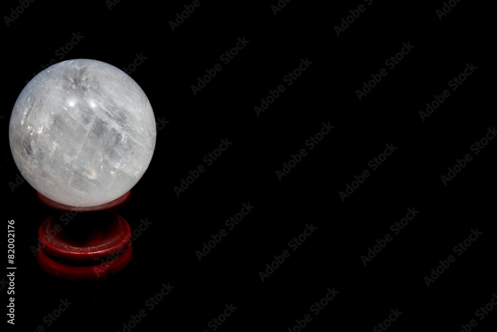 Crystal ball on black background