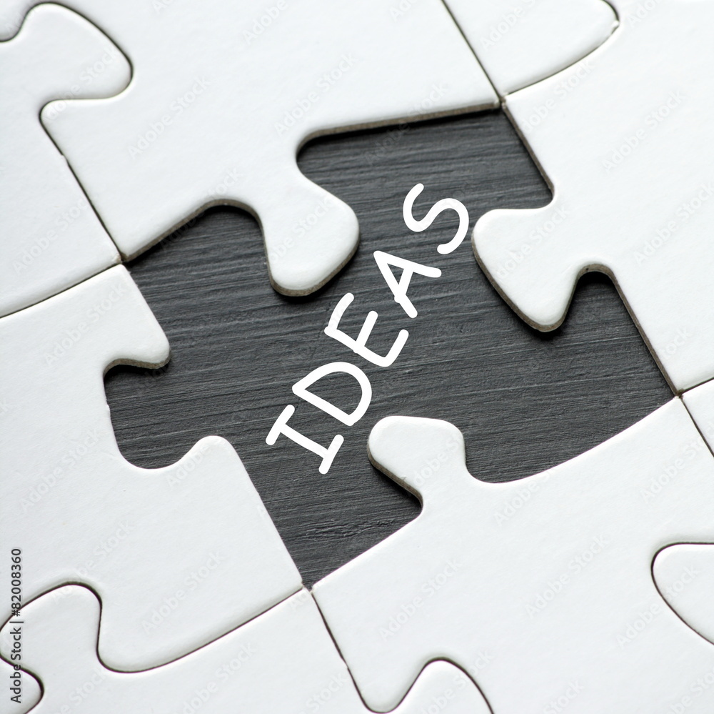 Fotografie The word IDEAS revealed by a missing jigsaw piece