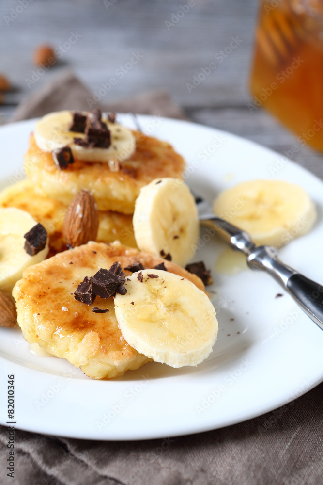 Curd pancake with chocolate and chunks banana