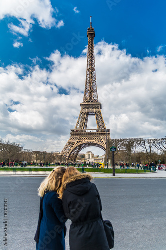 Blurred blond tourist silhouette over Eiffel tower © vladsogodel