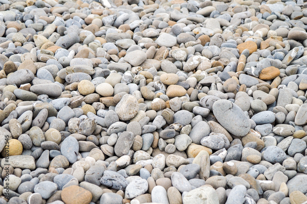 Several stones on beach, different shapes and colors Several stones on beach, different shapes and colors