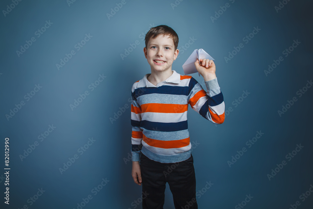 teenager boy of about ten European appearance Brown launches a p teenager boy of about ten European appearance Brown launches a p
