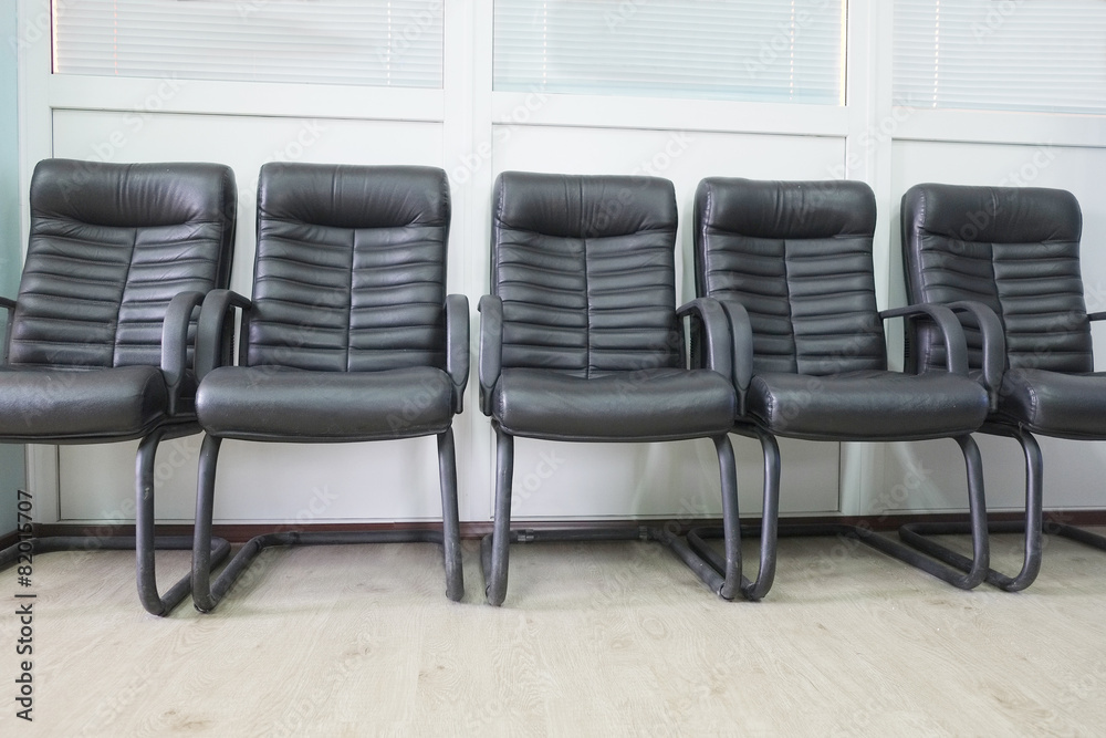 Fototapeta premium Leather chairs in a row