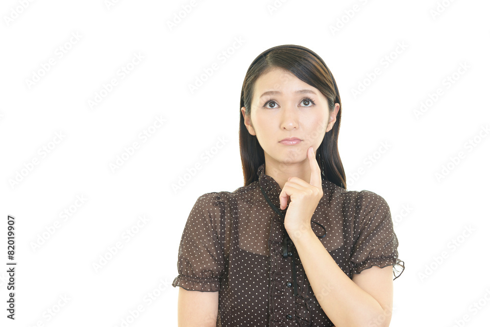 憂鬱な表情の女性