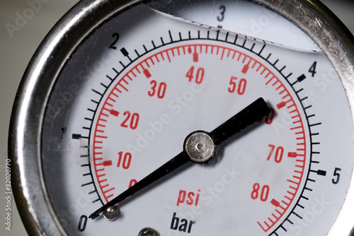 manometer turbo pressure meter gauge in pipes oil plant  photo