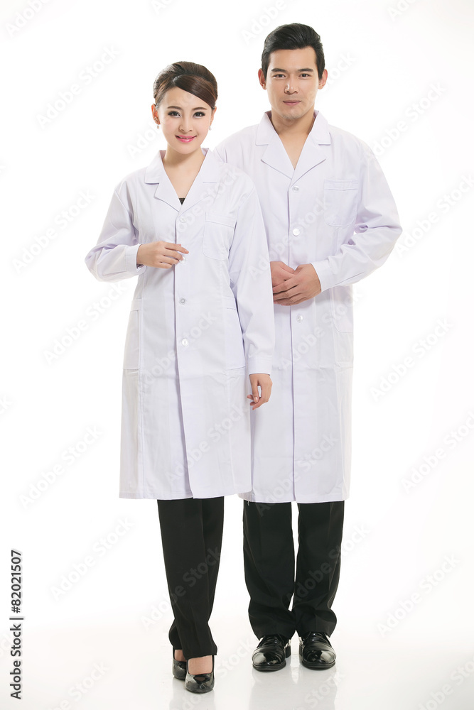 Staff wear coats in front of white background Staff wear coats in front of white background