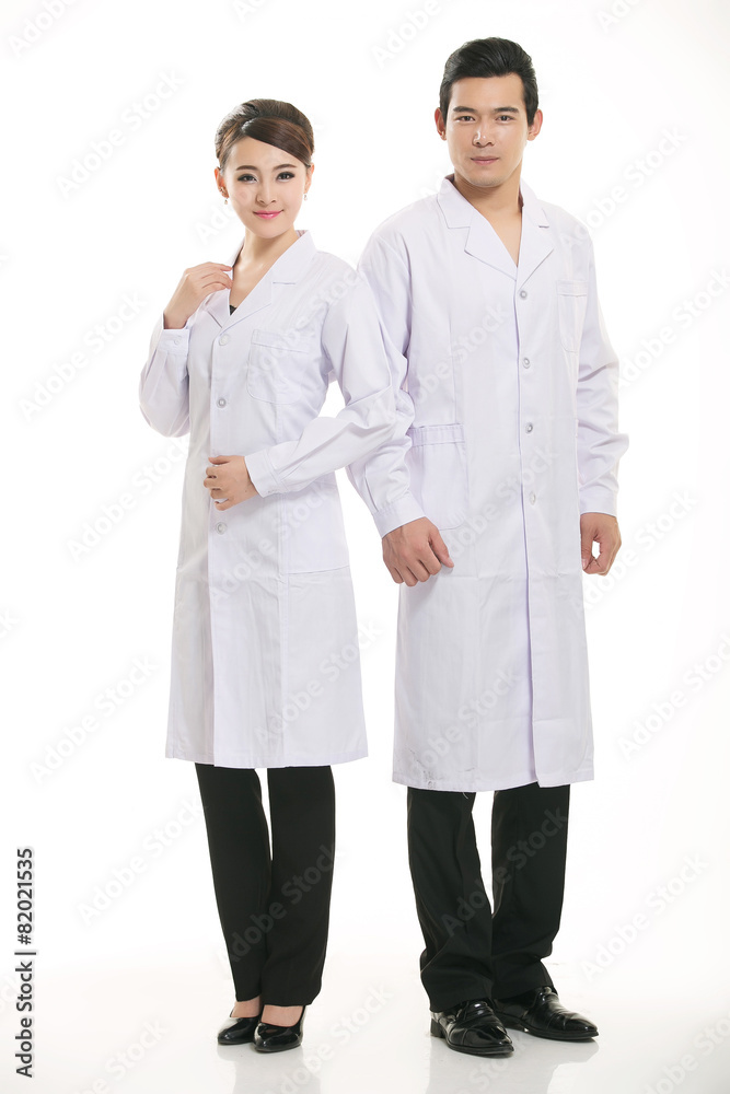 Staff wear coats in front of white background Staff wear coats in front of white background