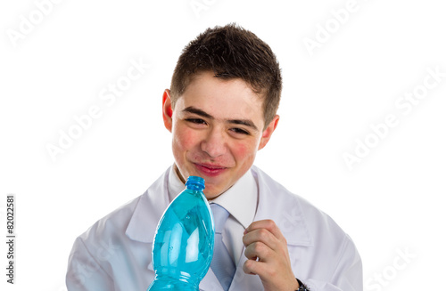 boy doctor drinking water from plastic bottle