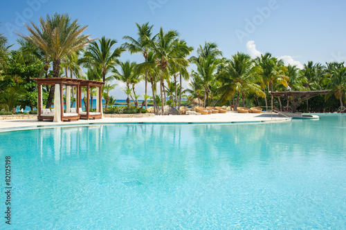 Fototapeta Naklejka Na Ścianę i Meble -  Outdoor Swimming pool of luxury hotel resort near the sea