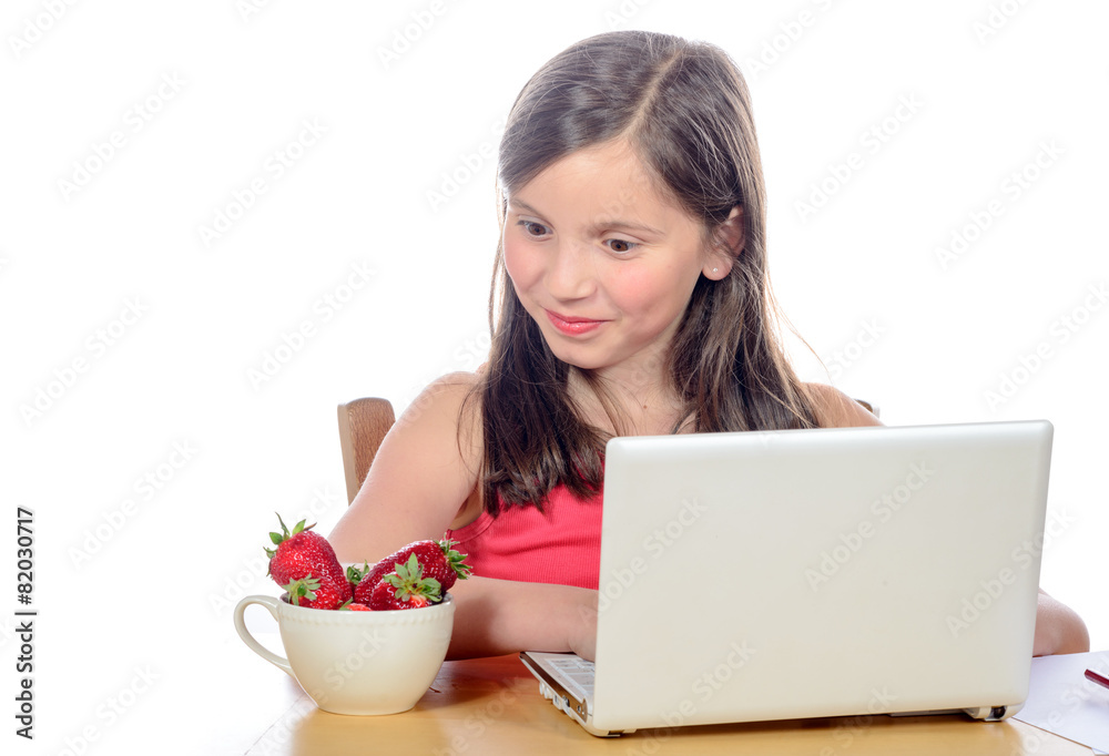 a little girl looking the strawberries with envy a little girl looking the strawberries with envy
