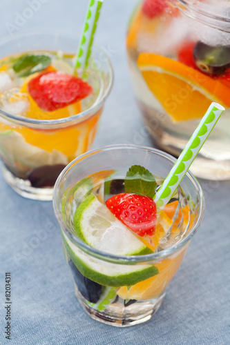 Refreshing white sangria  punch  with fruits  picnic idea