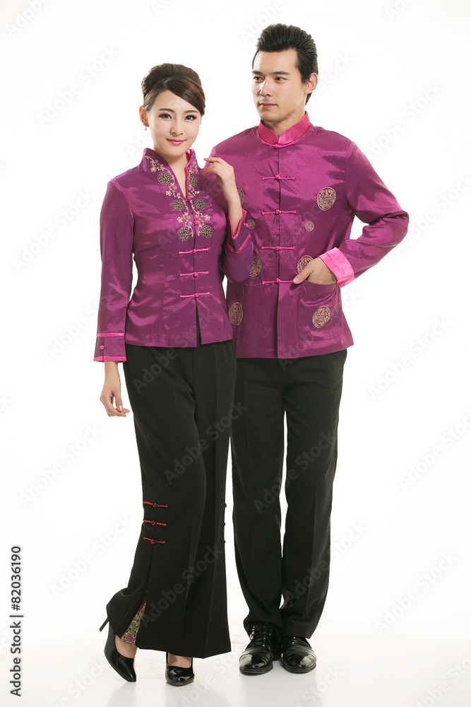 Wearing Chinese clothing waiter in front of a white background Wearing Chinese clothing waiter in front of a white background