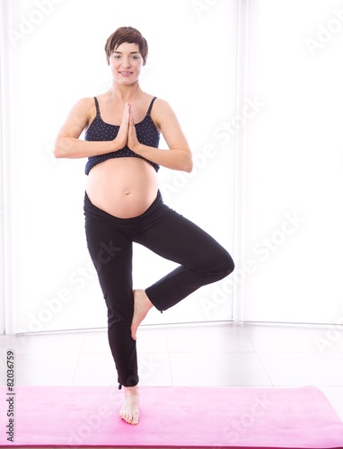 Pregnant woman keeping in shape