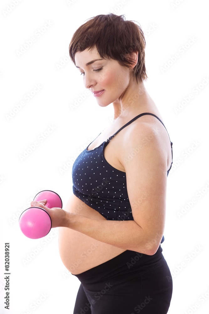 Pregnant woman keeping in shape Pregnant woman keeping in shape