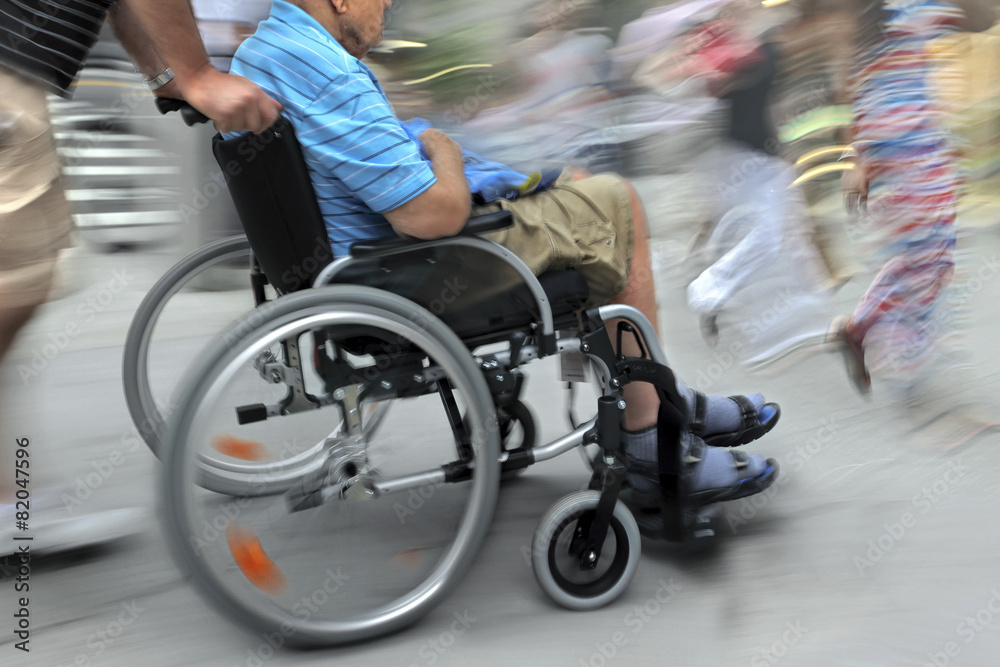 Obraz premium blurred movement disabled on a city street