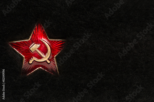 Fotografi Russian Red Star with Hammer and Sickle on Fur