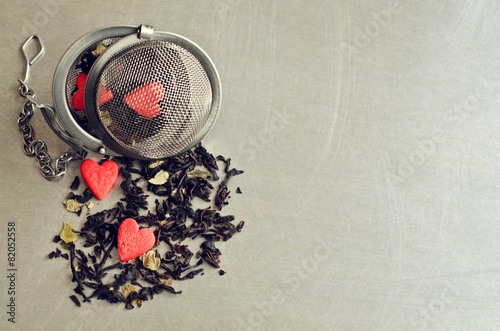Tea on the background of the strainer