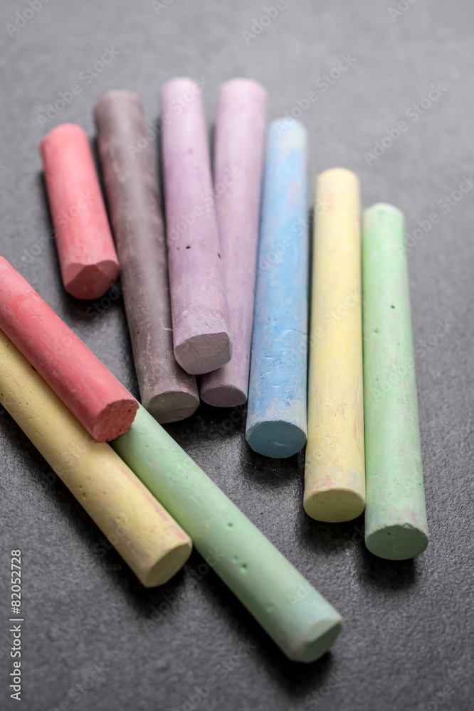 Colored chalk on a blackboard background Colored chalk on a blackboard background