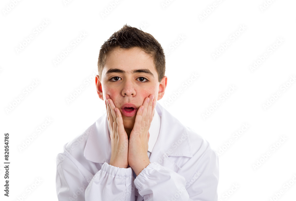 Puzzled boy doctor holding his chin Puzzled boy doctor holding his chin
