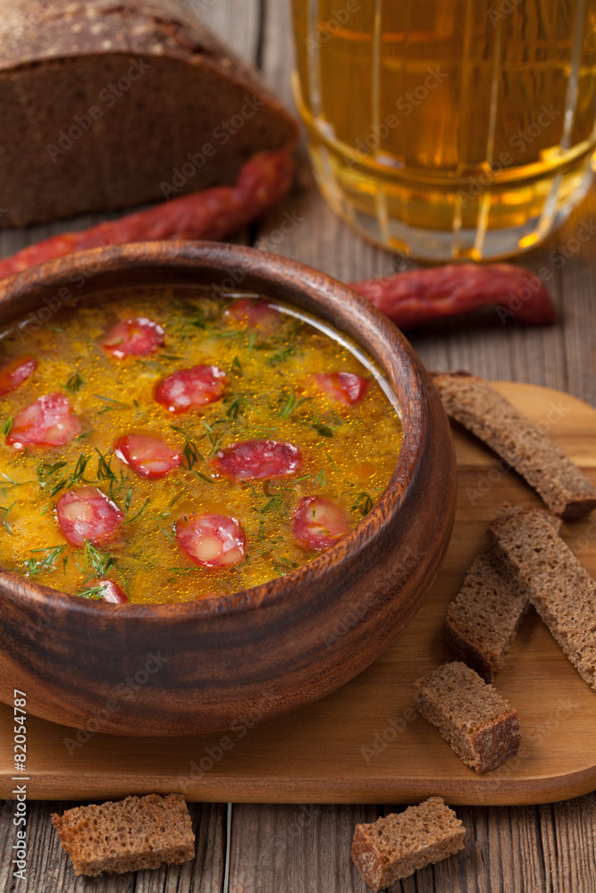 Rustic traditional beer soup with cheese sausage dill croutons a Rustic traditional beer soup with cheese sausage dill croutons a