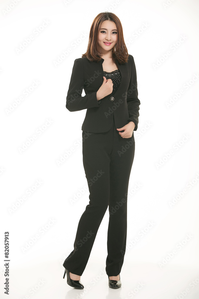 Young Asian women wearing a suit in front of a white background Young Asian women wearing a suit in front of a white background