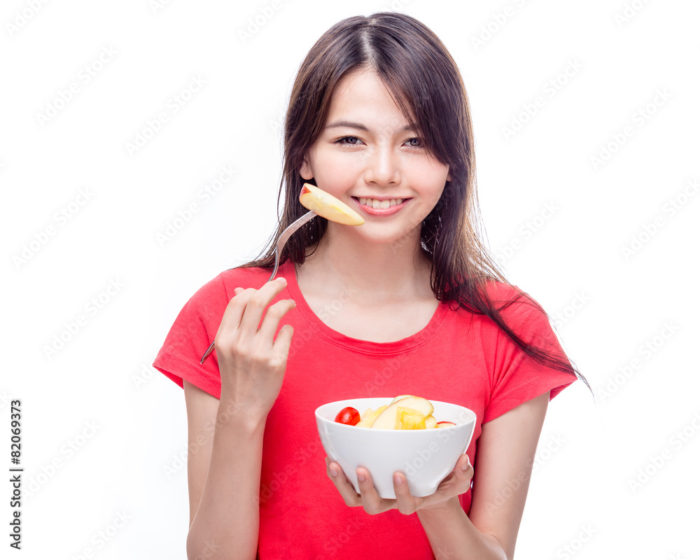 Chinese woman holding bowl of fruit Chinese woman holding bowl of fruit