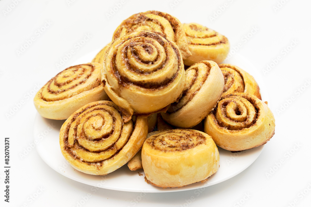 Fresh Sweet Homemade Cinnamon Rolls in a dish Fresh Sweet Homemade Cinnamon Rolls in a dish