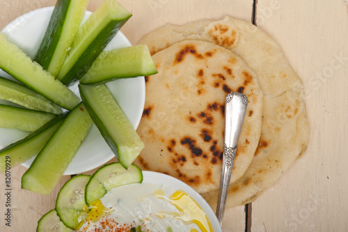 Arab middle east goat yogurt and cucumber salad photo