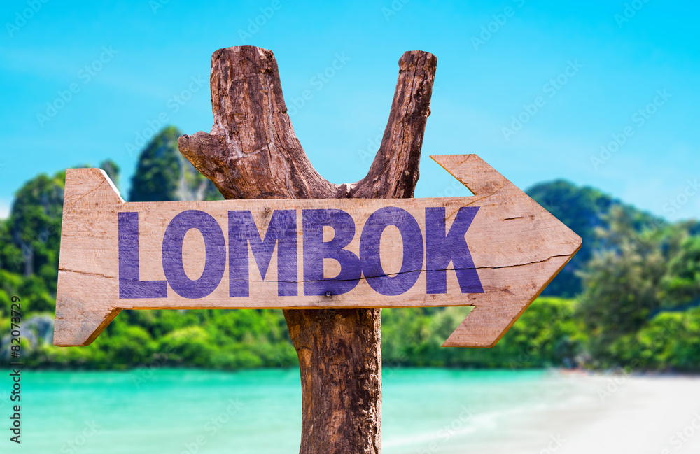 Lombok wooden sign with beach background