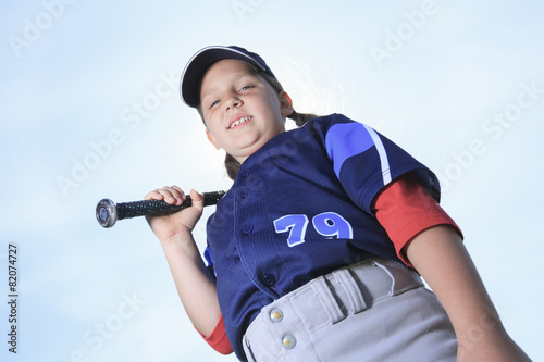 Photography A Baseball girl hitter over a blue sky