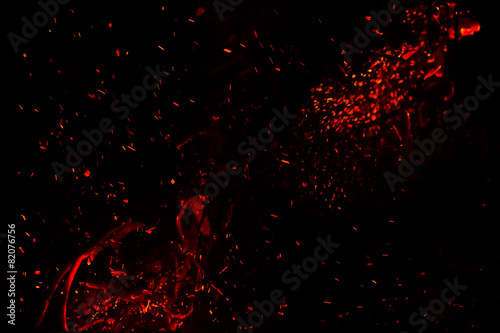 red sparks on a black background