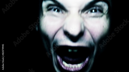 Horror scene screaming man face. Scary evil many faces. Devil